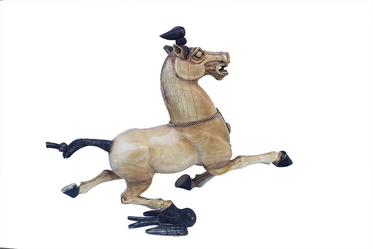 AN IVORY CARVING OF A HORSEChina, ... 