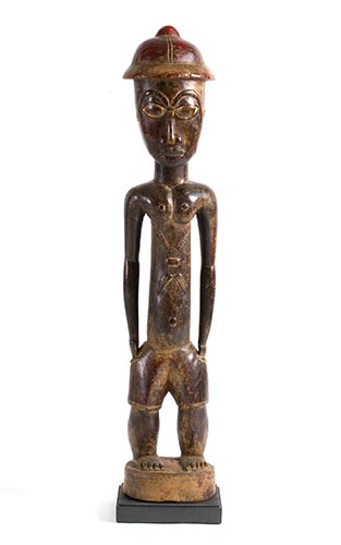 A WOODEN STANDING MALE FIGURE, ... 