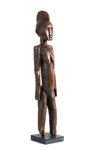 A WOODEN FIGURE OF A FEMALE ... 
