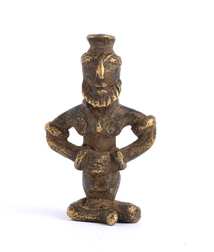 A BRONZE PENDANT WITH A BEARDED ... 