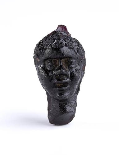 Roman glass blackmoor head pendant ... 