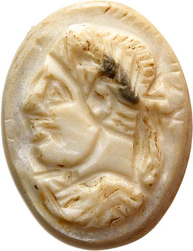 A burnt agate cameo. Bust of ... 