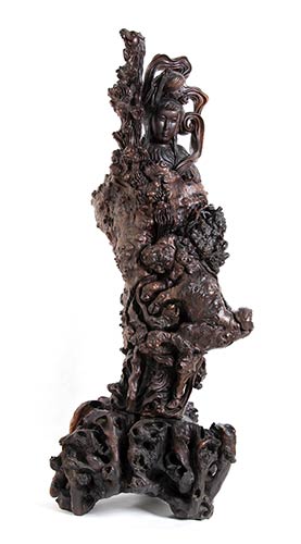 A LARGE ROOT CARVING OF A GUANYIN ... 