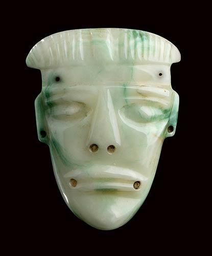 A WHITE AND GREEN JADE MASK Olmec ... 