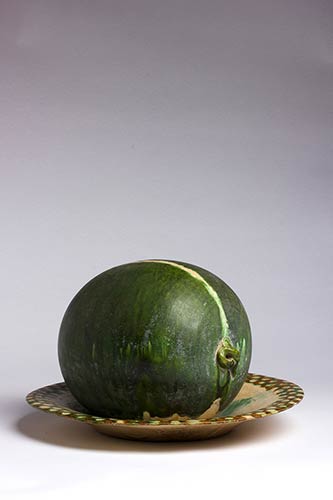 A SANCAI-GLAZED DISH WITH A ... 