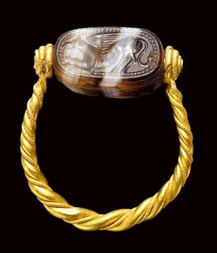 An etruscan banded agate scarab ... 