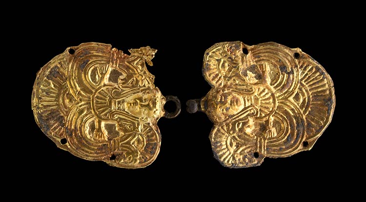 A pair of etruscan embossed gold ... 