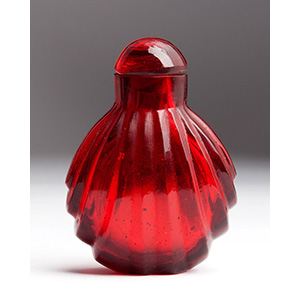 Carved red glass snuff bottle;
XX ... 