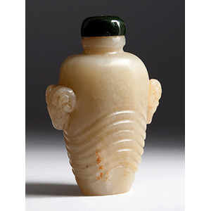 Carved white jade snuff bottle;
XX ... 