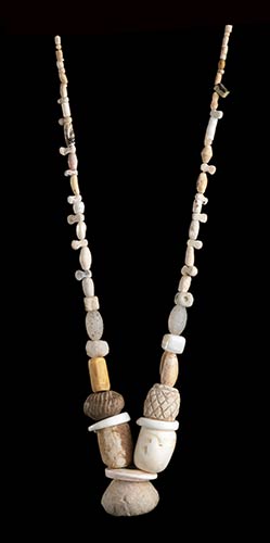A STONE AND POTTERY BEADS NECKLACE ... 