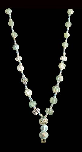 A FAIENCE AND GLASS BEADS NECKLACE ... 