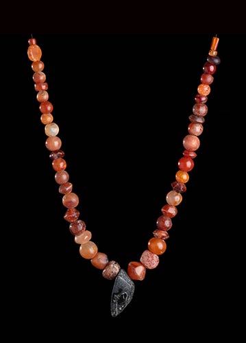A CARNELIAN BEADS NECKLACE WITH ... 