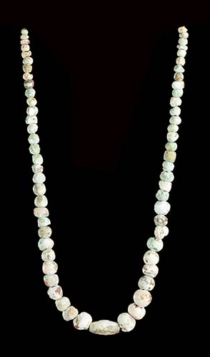 A CALCIFIED STONE BEADS NECKLACE56 ... 