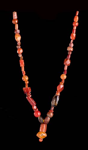 A CARNELIAN BEADS NECKLACE WITH ... 