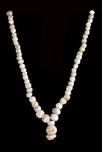 A CALCIFIED STONE BEADS NECKLACE ... 