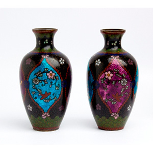 A pair of small enamelled porcellane vases, ... 