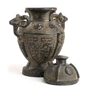 A METAL ARCHAISTIC VASE AND ... 