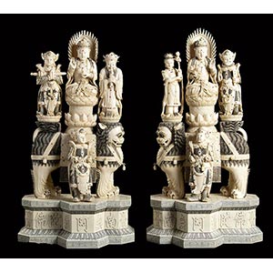 A PAIR OF IVORY CARVINGS OF GROUPS OF ... 