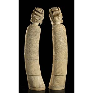 A PAIR OF LARGE IVORY CARVINGS OF ... 
