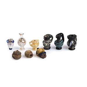 Collection of nine Roman juglet pendants, ... 