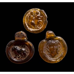 A lot of three eastern roman glass stamp ... 