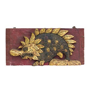 AN INDONESIAN LACQUERED AND GILT CARVED WOOD ... 