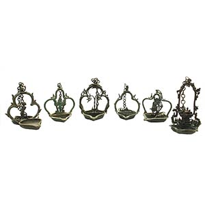 SIX INDONESIAN BRONZE OIL LAMPS

the larger ... 