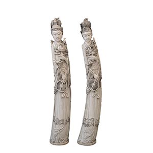A PAIR OF LARGE IVORY CARVED STANDING ... 