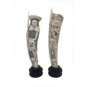 A PAIR OF IVORY CARVINGS OF STANDING FEMALE ... 