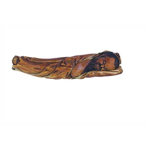 A LARGE IVORY CARVING OF A SLEEPING ... 