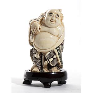 A Japanese ivory carving of Buddha ... 