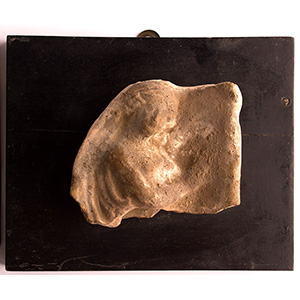 Slab with female figure profile in ... 