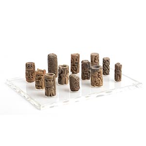 Collection of twelve terracotta cylindrical ... 