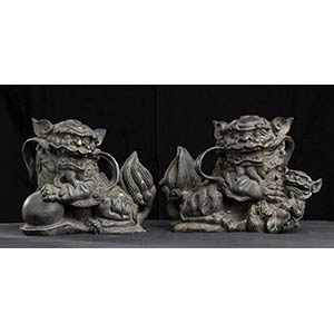 A PAIR OF METAL SCULPTURES OF BUDDHIST ... 