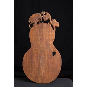 A WOOD GOURD-SHAPED PANEL WITH ... 