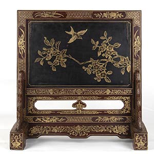 A LACQUERED, GILT AND CARVED WOOD ... 