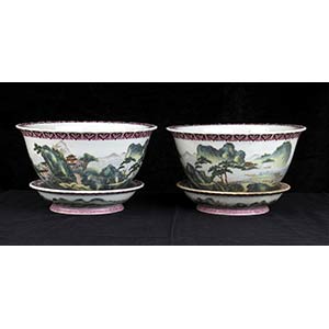 A PAIR OF POLYCHROME PORCELAIN CACHEPOTS AND ... 