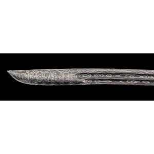 A DAMASCENED METAL DAGGER WITH ... 