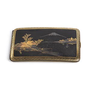 A KOMAI STYLE LACQUERED AND GILT METAL ... 
