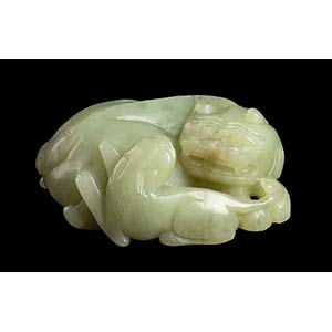 A PALE GREEN JADE LION AND CUBChina, ... 