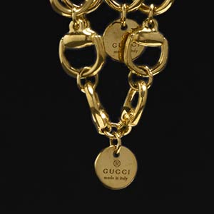Gucci gold logo earrings  made of ... 