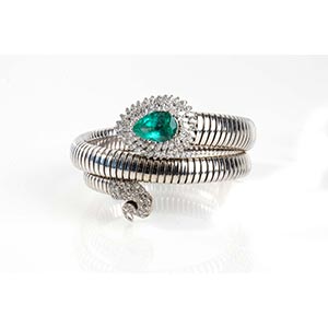 Snake  gold bracelet diamonds and emerald  ... 