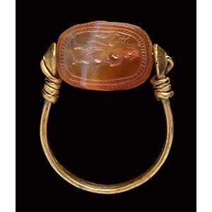 An etruscan agate scarab intaglio, mounted ... 