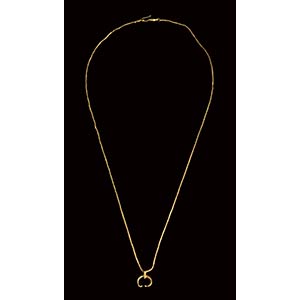 
A roman gold necklace with a moon crescent ... 