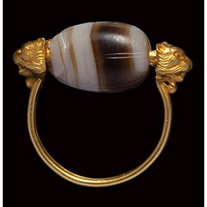 An etruscan banded agate scarab ... 