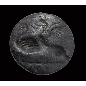 A minoan hematite engraved seal. Two ... 