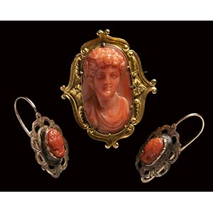 A Victorian red coral cameo set in a gold ... 