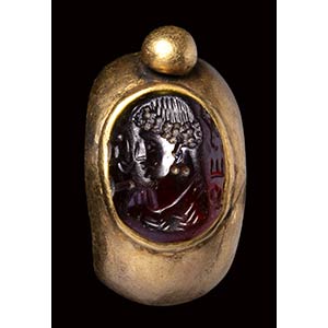 A North-West Indian gold ring with garnet ... 