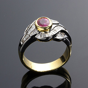 A Ruby & Diamonds Ring; ; Tapered cut ... 