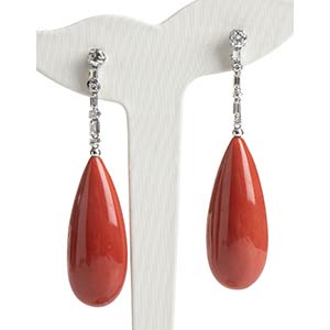 White gold dangle earrings composed of a ... 